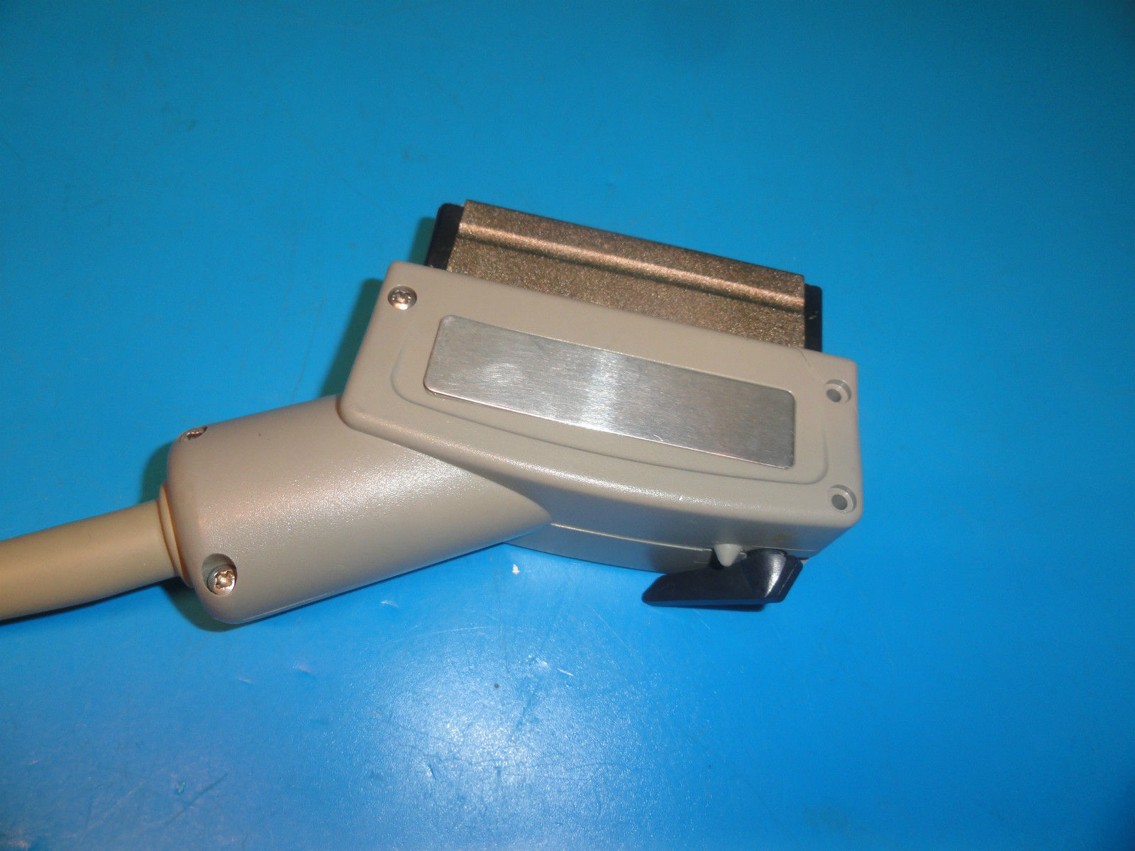 a close up of a probe connector on a table