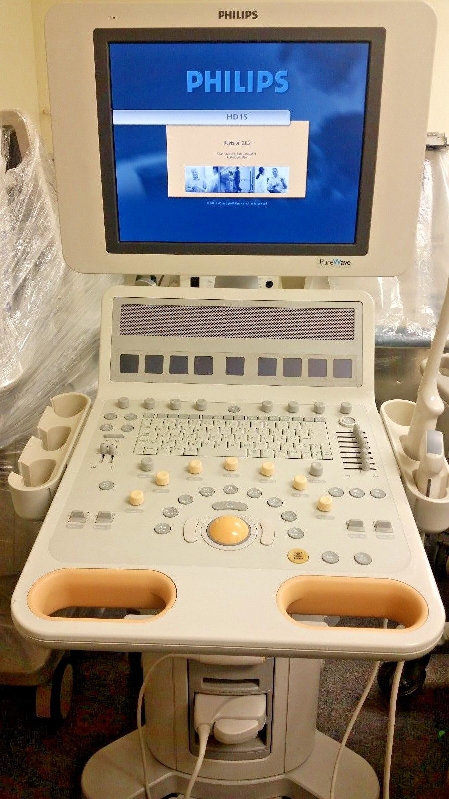 a laptop computer sitting on top of a table