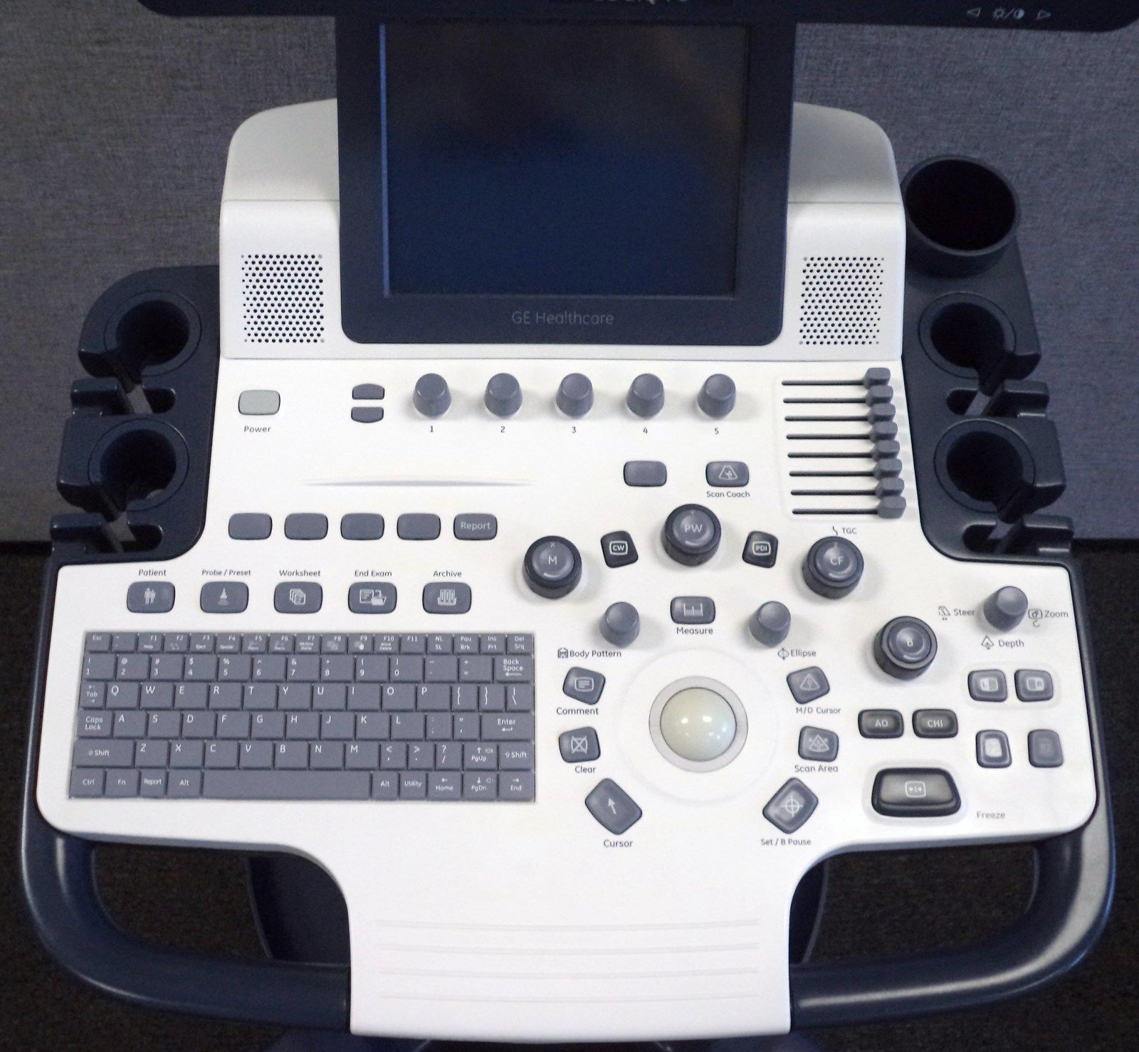 a computer monitor sitting on top of a desk