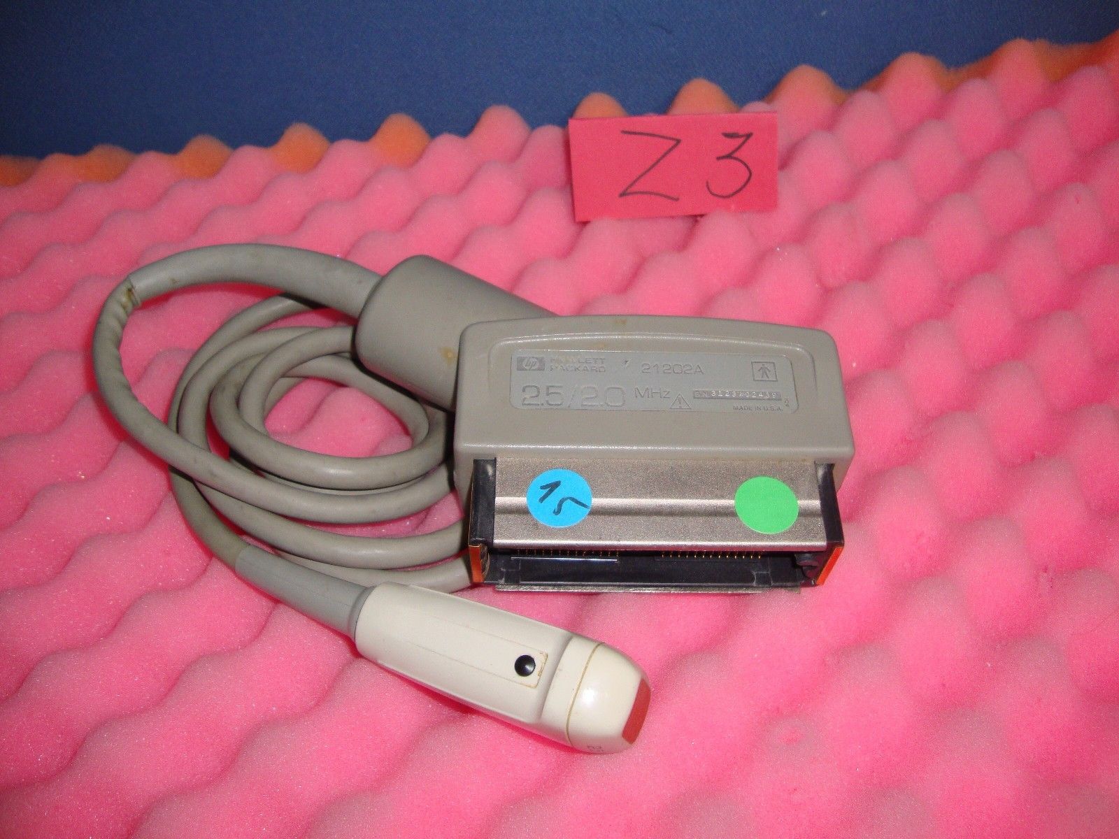 complete probe sitting on top of a pink blanket